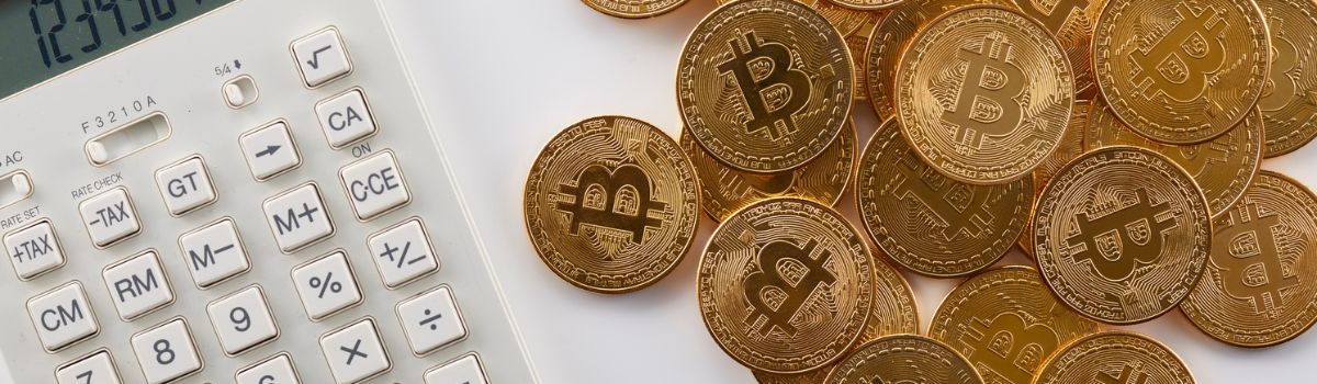 Calculator and bitcoin coins arrangement